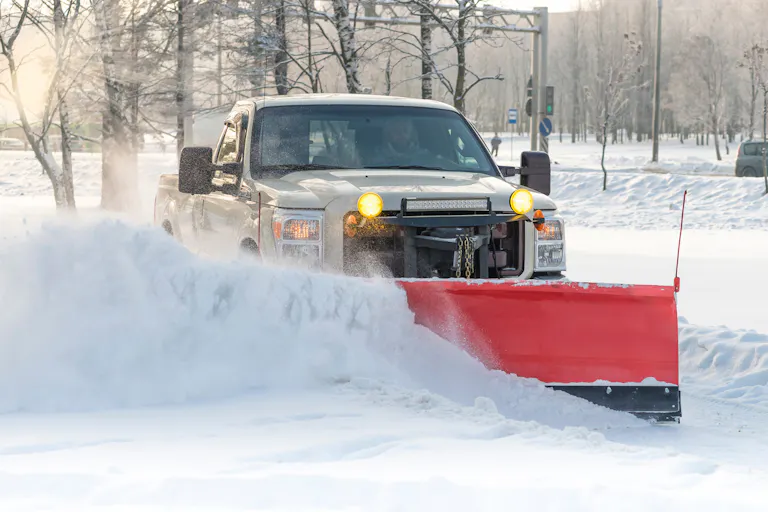 KBS Exterior Services plowing snow